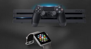 Console noire avec manette et montre connectée affichant des applications colorées sur fond sombre.