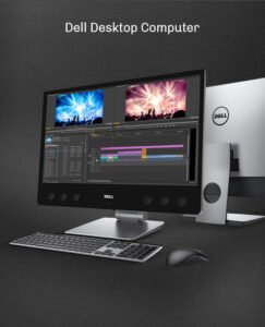 Ordinateur Dell avec logiciel de montage vidéo, clavier et souris sur fond sombre.