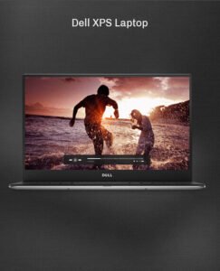 Ordinateur Dell XPS affichant une plage avec deux personnes au coucher du soleil.